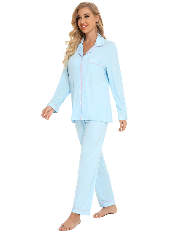 Woman wearing a light blue pajama set on a white background